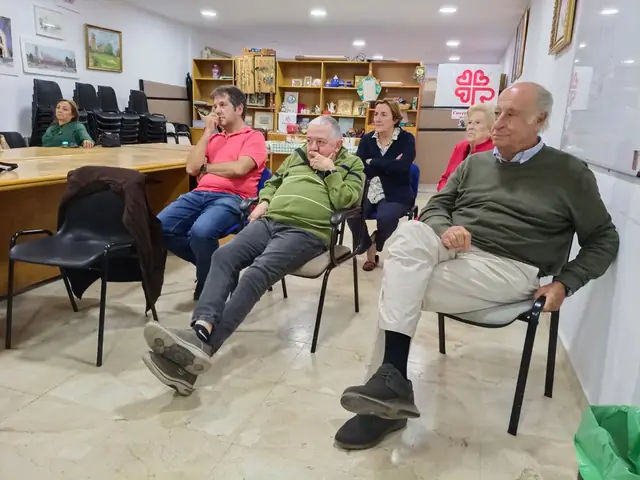 Asistentes escuchando las intervenciones